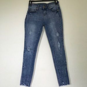 Low-waisted distressed jeans